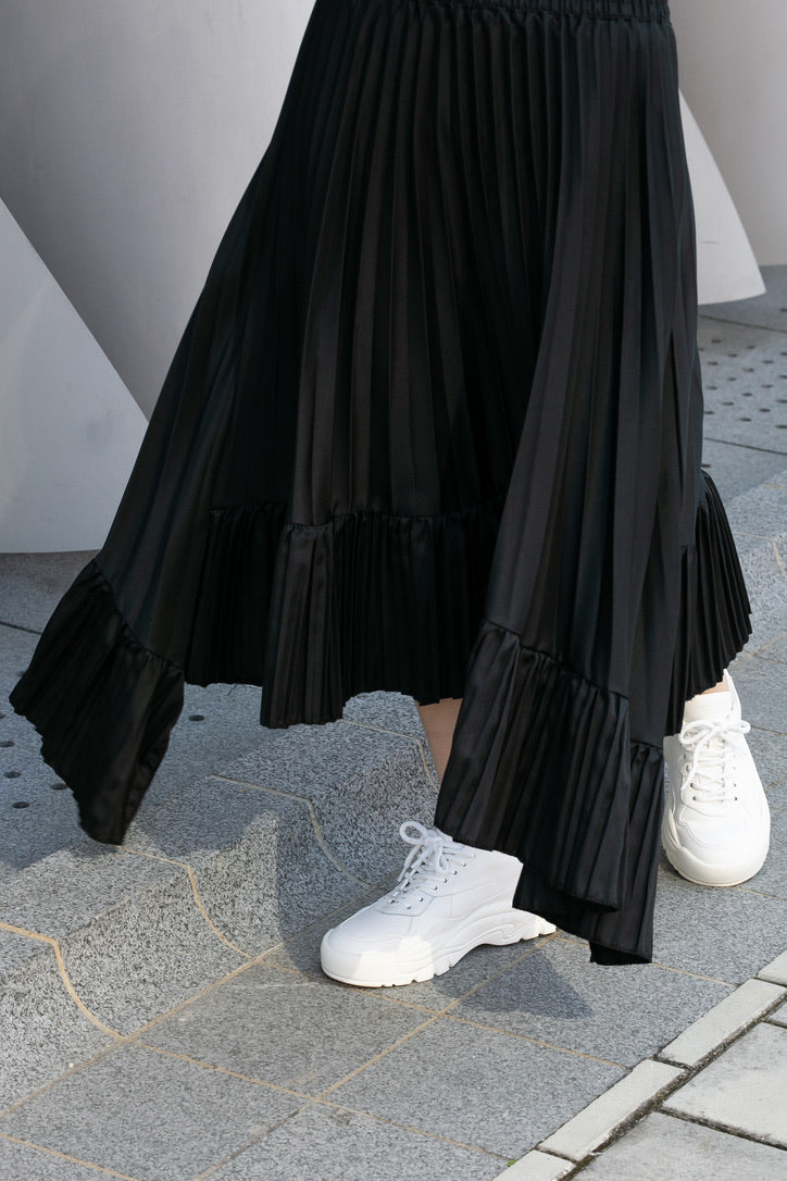 IRREGULAR PLEATED SKIRT