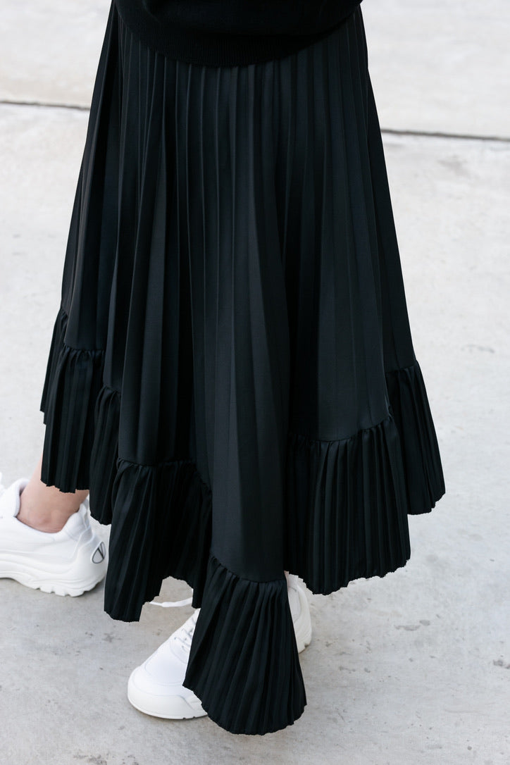 IRREGULAR PLEATED SKIRT