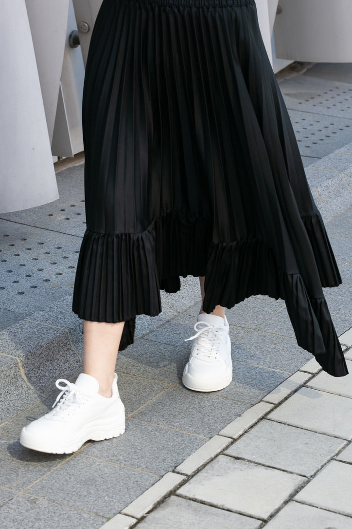 IRREGULAR PLEATED SKIRT